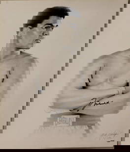 Muhammad Ali Signed 20x24 Lithograph Photo PSA/DNA Certified: Muhammad Ali Signed 20x24 Lithograph Photo PSA/DNA Certified This authentic signed 20X24 lithograph features the legendary Muhammad Ali, certified by PSA/DNA. The artwork is an original piece that sho