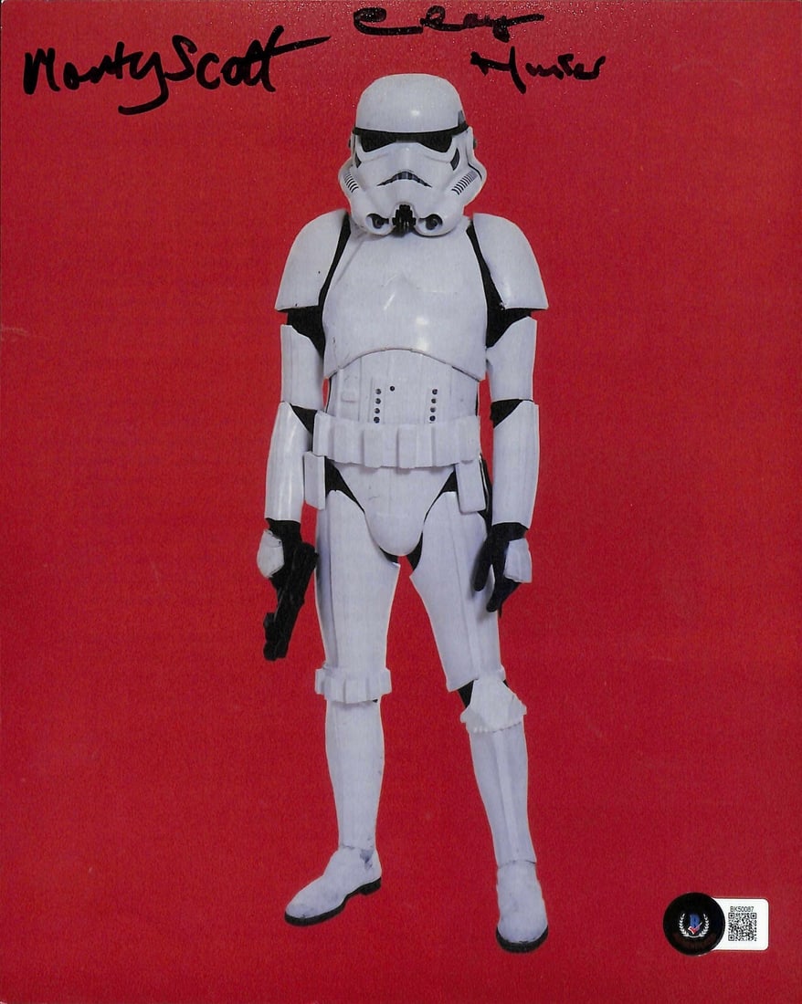 Monty Scott Clay Hunter Star Wars ROTJ Signed 8x10 Photo Beckett Certified: Monty Scott Clay Hunter Star Wars ROTJ Signed 8x10 Photo Beckett Certified This is an autographed 8x10 photograph featuring Monty Scott and Clay Hunter, both known for their roles as Stormtroopers in