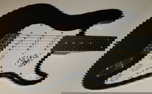 Flea Signed Electric Guitar Red Hot Chili Peppers JSA Authenticated: Flea Signed Electric Guitar Red Hot Chili Peppers JSA Authenticated This pre-owned electric guitar is autographed by Flea, the iconic bassist of the Red Hot Chili Peppers. The signature has been authe