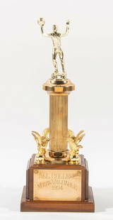Bill Russell 1954 NCAA MVP Trophy with COA 15 inch Tall: Bill Russell 1954 NCAA MVP Trophy with COA 15 inch Tall This historic trophy commemorates Bill Russell's achievement as the 1954 NCAA MVP Award winner. Standing at 15 inches tall, the trophy features