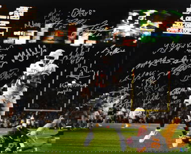 2005 Texas Longhorns Signed 16x20 Touchdown Run Photo: 2005 Texas Longhorns Signed 16x20 Touchdown Run Photo This original 16x20 photograph captures a dynamic touchdown run by the 2005 Texas Longhorns football team. Authentically signed, this piece is a m