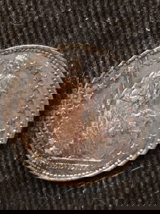 1876 Silver Switzerland Franc Toned Uncertified Coin: 1876 Silver Switzerland Franc Toned Uncertified Coin This 1876 Silver Switzerland Franc features a beautiful toning, showcasing its age and history. It is in pre-owned condition and is uncertified, of