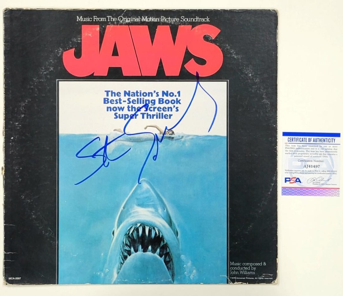 Steven Spielberg Signed Jaws Soundtrack Cover PSA Authenticated: Steven Spielberg Signed Jaws Soundtrack Cover PSA Authenticated This is an original soundtrack cover from the iconic movie Jaws, personally signed by renowned director Steven Spielberg. The autograph 