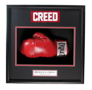 Michael B. Jordan Signed Adonis Creed Boxing Glove Framed 19x19 Beckett Authenticated: Michael B. Jordan Signed Adonis Creed Boxing Glove Framed 19x19 Beckett Authenticated Offered is a Michael B. Jordan Signed Left Boxing Glove "Adonis Creed" Framed. The outer frame size is 19 inches x