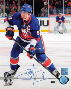 John Tavares signed 8x10 photo - Frozen Pond: John Tavares signed 8x10 photo - Frozen Pond This is an original signed 8x10 photo of hockey player John Tavares, who is a future Hall of Famer and played for the New York Islanders. The photograph ca