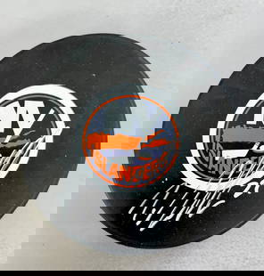 Milan Jurcina Signed New York Islanders NHL Puck with Case: Milan Jurcina Signed New York Islanders NHL Puck with Case This official New York Islanders NHL logo puck is signed by defenseman Milan Jurcina, showcasing his perfect signature. The puck is guarantee