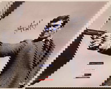 George Lazenby Signed 16x20 James Bond Photo PSA/DNA COA: George Lazenby Signed 16x20 James Bond Photo PSA/DNA COA This striking 16x20 photograph features George Lazenby, known for his role as James Bond, and is signed by the actor himself. The autograph has