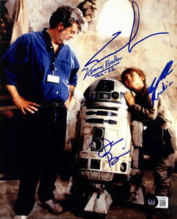 George Lucas Jake Lloyd Star Wars Signed Photo with R2-D2 Anakin Inscription BECKETT LOA: George Lucas Jake Lloyd Star Wars Signed Photo with R2-D2 Anakin Inscription BECKETT LOA This autographed 8x10 color photograph features iconic figures from Star Wars: The Phantom Menace, signed in bl