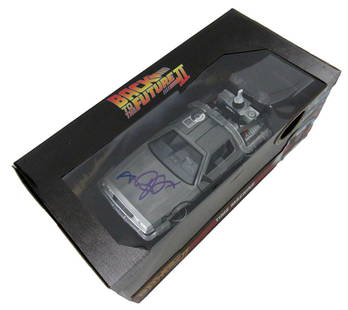 Michael J Fox Signed DeLorean Time Machine Diecast BAS Authenticated: Michael J Fox Signed DeLorean Time Machine Diecast BAS Authenticated This collectible item features a Michael J. Fox autographed diecast model of the iconic DeLorean Time Machine from "Back to the Fut