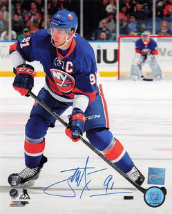 John Tavares signed 8x10 photo - Frozen Pond: John Tavares signed 8x10 photo - Frozen Pond Capture the essence of hockey with this official color 8x10 photo featuring future Hall of Famer John Tavares of the New York Islanders. This dynamic image
