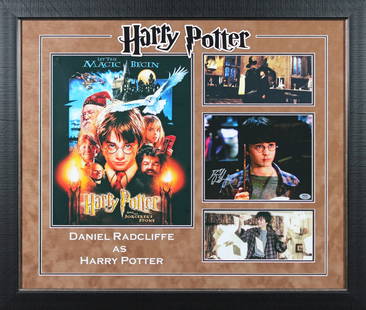 Daniel Radcliffe Signed Framed Display Harry Potter PSA/DNA: Daniel Radcliffe Signed Framed Display Harry Potter PSA/DNA This is an authentic, signed, framed display featuring a photograph of Daniel Radcliffe from 'Harry Potter & The Sorcerer's Stone.' The disp