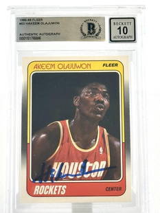 1988-89 Fleer Hakeem Olajuwon Autographed Card BAS 10 #53: 1988-89 Fleer Hakeem Olajuwon Autographed Card BAS 10 #53 This 1988-89 Fleer #53 sports trading card features the legendary Hakeem Olajuwon of the Houston Rockets. This autographed card showcases