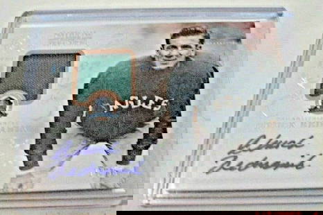 Chuck Bednarik 2013 National Treasures Autographed Game Used Jersey Card 13/50: Chuck Bednarik 2013 National Treasures Autographed Game Used Jersey Card 13/50 This is a collectible card featuring a game-used jersey and an autograph from Chuck Bednarik, a legendary figure in NFL