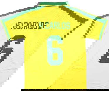 Roberto Carlos Signed Brazil #6 Soccer Jersey with Beckett Hologram: Roberto Carlos Signed Brazil #6 Soccer Jersey with Beckett Hologram This original Brazil FC home yellow soccer jersey is signed by legendary player Roberto Carlos, featuring the iconic number 6. The j