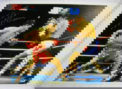 Julio Cesar Chavez Sr. Signed 16x20 Canvas Photo PSA/DNA COA Boxing: Julio Cesar Chavez Sr. Signed 16x20 Canvas Photo PSA/DNA COA Boxing This striking 16x20 photo on canvas captures the legendary Julio Cesar Chavez Sr. in a memorable moment from his boxing career. The