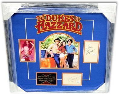 The Dukes of Hazzard Cast Signed Framed Collage 22 x 23 JSA Authenticated: The Dukes of Hazzard Cast Signed Framed Collage 22 x 23 JSA Authenticated This stunning framed collage features autographs from the beloved cast of 'The Dukes of Hazzard,' including John Schneider, Ca