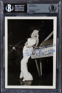 Jayne Mansfield Signed 5x7 B&W Photo to Marilyn Holcomb Beckett Authenticated: Jayne Mansfield Signed 5x7 B&W Photo to Marilyn Holcomb Beckett Authenticated This striking 5x7 black and white photograph features a sultry image of Jayne Mansfield, personally signed with the inscri