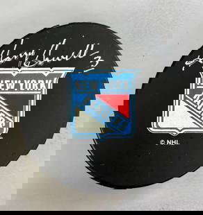 Harry Howell Signed NHL Puck - New York Rangers: Harry Howell Signed NHL Puck - New York Rangers This is an official New York Rangers NHL logo puck, beautifully signed by Hall of Famer Harry Howell. Acquired during a private signing, the autograph i