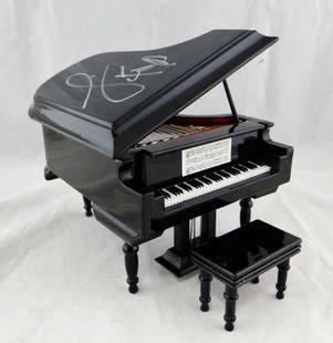Jamie Foxx Signed Mini Piano from Ray JSA Authenticated: Jamie Foxx Signed Mini Piano from Ray JSA Authenticated Celebrate the legacy of the acclaimed film 'Ray' with this Jamie Foxx autographed mini piano. This unique collectible features a signature from