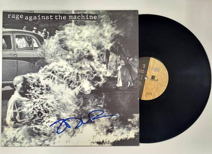Zack De La Rocha Signed Rage Against the Machine Album Cover Beckett Authenticated: Zack De La Rocha Signed Rage Against the Machine Album Cover Beckett Authenticated This is an original album cover signed by Zack De La Rocha, the lead vocalist of Rage Against the Machine. The autogr