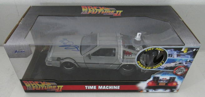 Michael J Fox Signed Back To The Future II Time Machine BAS Certified: Michael J Fox Signed Back To The Future II Time Machine BAS Certified Offered is a Michael J. Fox Signed/Autographed "Back To Future II" Jada Time Machine. Michael Fox's autograph on the Time Machine