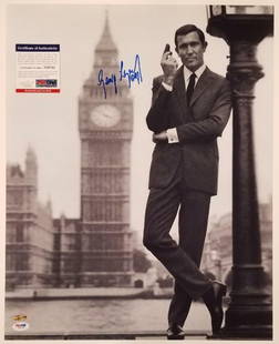 George Lazenby Autographed 16x20 James Bond Photo PSA/DNA COA: George Lazenby Autographed 16x20 James Bond Photo PSA/DNA COA This is an original 16x20 photograph of George Lazenby, who portrayed James Bond in the iconic film series. The photo is autographed by La
