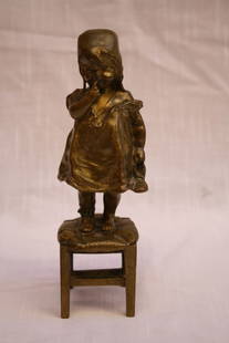 Early 1900s French Bronze Statue of Humorous Girl by Juan Clara: Early 1900s French Bronze Statue of Humorous Girl by Juan Clara This exquisite early 1900's French bronze statue, created by the renowned Spanish artist Juan Clara (1875-1957), depicts a charming and