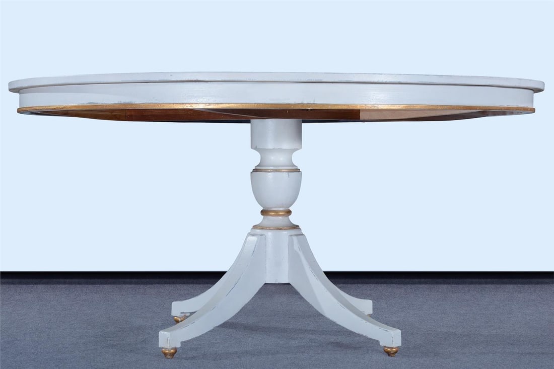 White Dining Table with Antique White Gold Accents: White Dining Table with Antique White Gold Accents Introducing the White Carrington Dining Table, a stunning centerpiece that combines antique charm with modern elegance. Crafted from solid wood, this