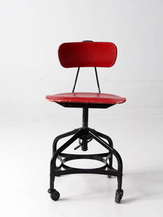 Mid Century Toledo Swivel Chair Black Red Industrial Design: Mid Century Toledo Swivel Chair Black Red Industrial Design This mid-century American industrial draftsman swivel chair, crafted by Toledo Metal Furniture Company, showcases a durable metal base compl