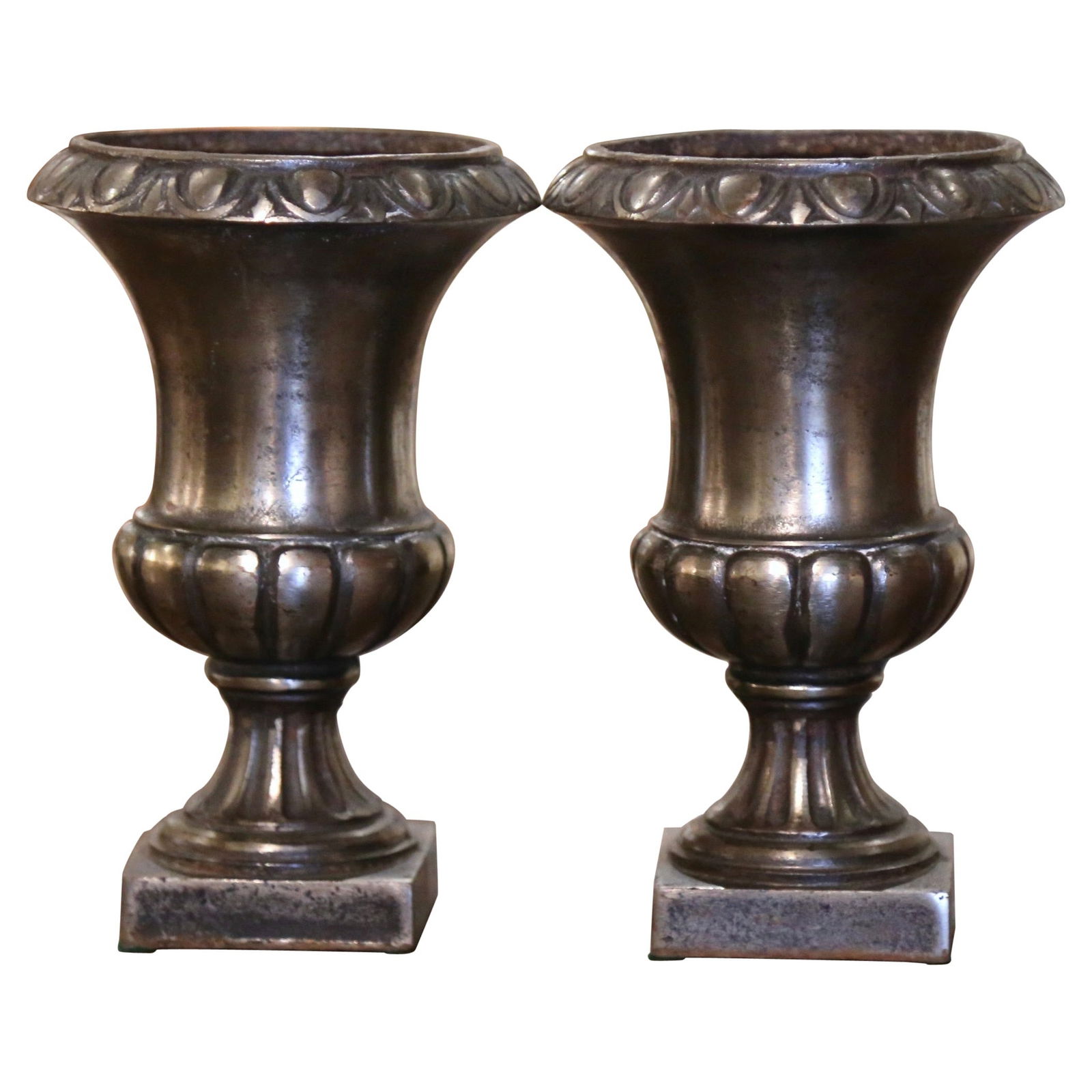 19th Century French Neoclassical Iron Urns Set of 2: 19th Century French Neoclassical Iron Urns Set of 2 Enhance your decor with this exquisite pair of 19th Century French Neoclassical polished iron campana form urns, crafted circa 1870. These elegant u