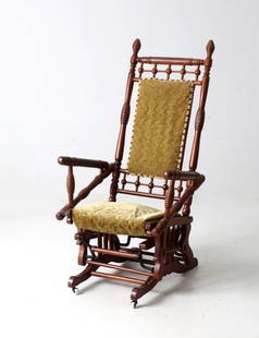 Victorian Antique Rocking Chair with Velvet Upholstery: Victorian Antique Rocking Chair with Velvet Upholstery This antique Victorian rocking chair, featuring intricate stick and ball detailing and velvet upholstery, offers a touch of elegance and comfort,