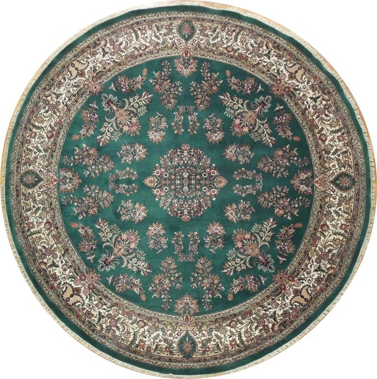 10 Feet Round Green Jaipur Handmade Wool Rug: 10 Feet Round Green Jaipur Handmade Wool Rug Enhance your living space with this exquisite 10.0 x 10.0 Feet Round Green Jaipur Handmade Rug, crafted from lustrous wool for a luxurious feel. Perfect fo