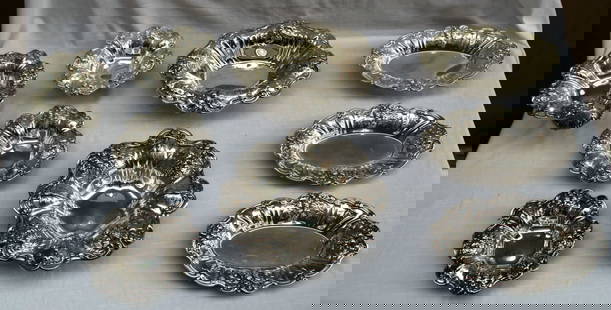 9 Piece Reed & Barton Francis I Sterling Silver Centerpieces Set: 9 Piece Reed & Barton Francis I Sterling Silver Centerpieces Set Discover a stunning collection of 9 pieces of Francis I. sterling silver centerpieces crafted by Reed & Barton, dating from 1900 to 194