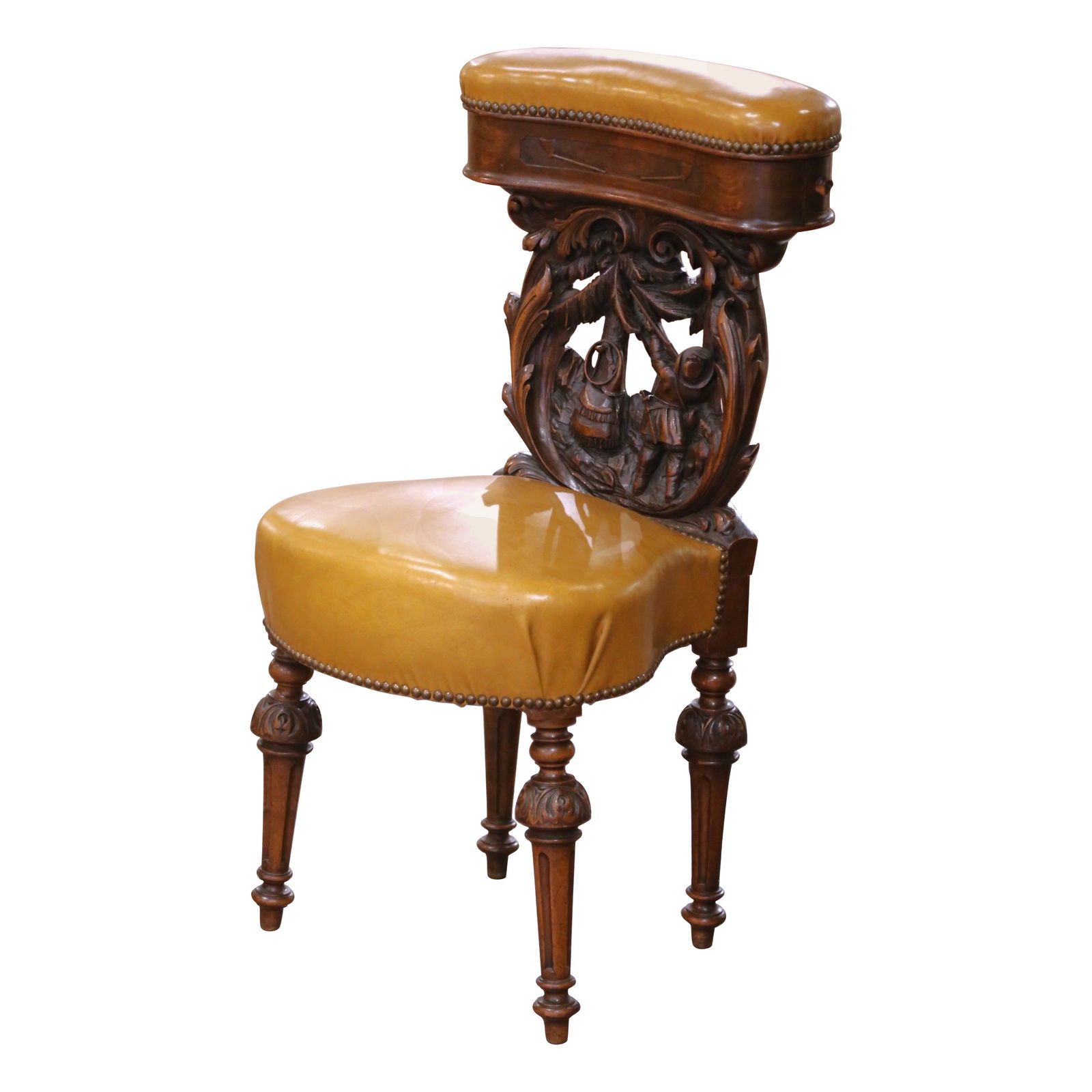 19th Century Black Forest Walnut Leather Smoking Chair with Cigar Drawer: 19th Century Black Forest Walnut Leather Smoking Chair with Cigar Drawer This exquisite 19th Century Black Forest smoking chair, known as "Chaise de Fumeur," is a stunning blend of form and function.