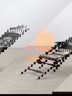 Antique Victorian Folding Lawn Chair with Tapestry Seat: Antique Victorian Folding Lawn Chair with Tapestry Seat A late Victorian era lawn chair. The dark wood folding chair features an intricately carved top back slat. A richly toned tapestry shapes the se