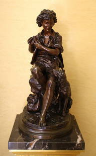 19th Century Bronze Sculpture by Eugene Aizelin Museum Piece: 19th Century Bronze Sculpture by Eugene Aizelin Museum Piece This stunning 19th-century bronze sculpture by renowned artist Eugene Aizelin (1821-1902) features a charming boy intently carving a dog's
