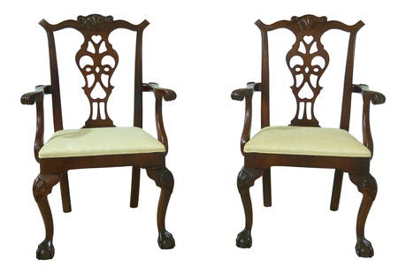 Elegant Pair of Mahogany Chippendale Armchairs with Claw Feet: Elegant Pair of Mahogany Chippendale Armchairs with Claw Feet This exquisite pair of Chippendale-style armchairs showcases quality construction and timeless elegance. Crafted from mahogany, these chai