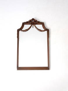 Early 20th Century French Decorative Art Mirror Rococo Design 43.25x26.75: Early 20th Century French Decorative Art Mirror Rococo Design 43.25x26.75 This elegant antique mirror showcases the exquisite craftsmanship of early 20th-century French Decorative Art. The wooden fram