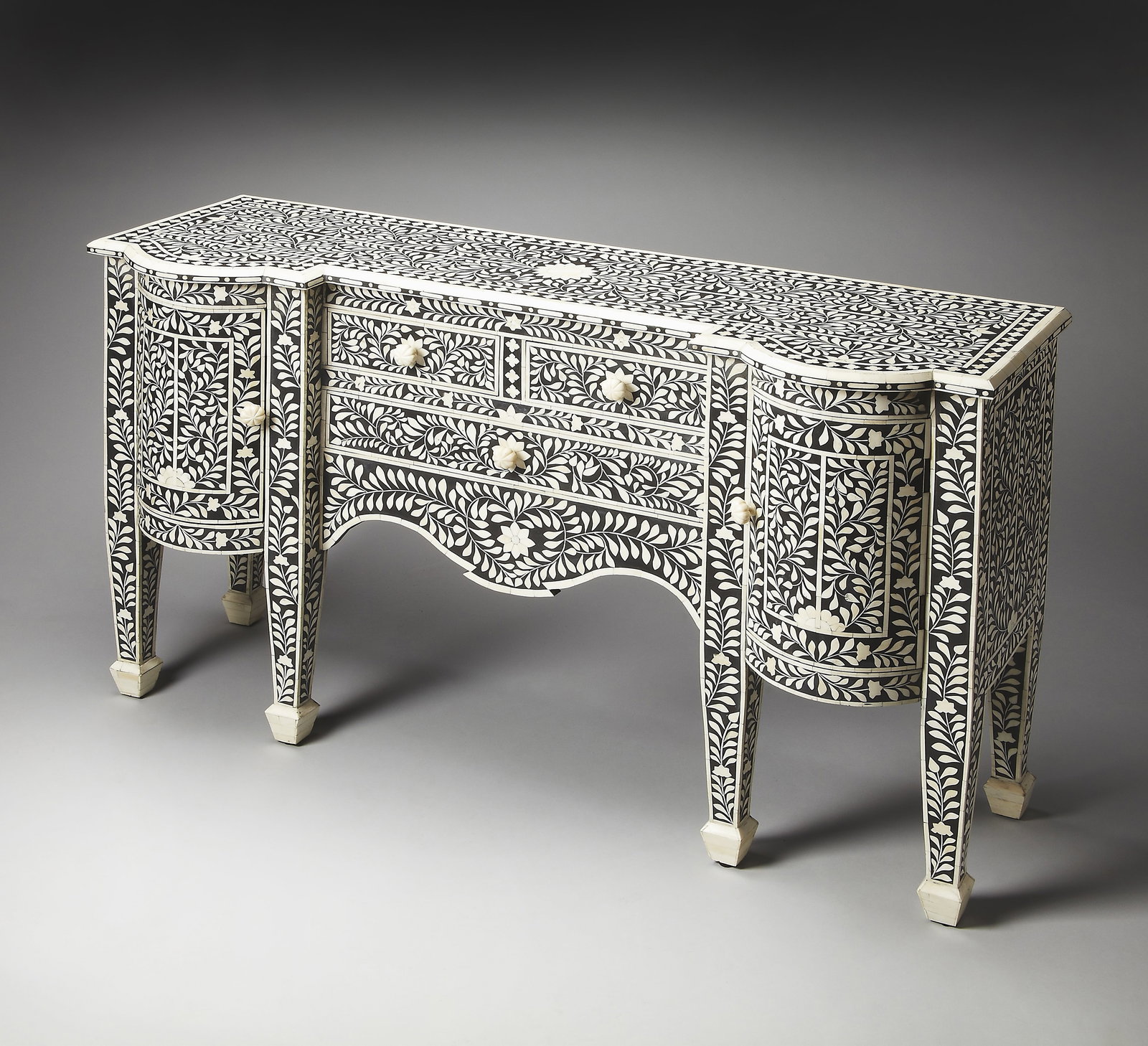 Butler Vivienne Collection Black Bone Inlay Buffet Moroccan Style: Butler Vivienne Collection Black Bone Inlay Buffet Moroccan Style Elevate your dining space with this exquisite Unique Butler Black Inlay Buffet from the Vivienne Collection. This buffet features a st