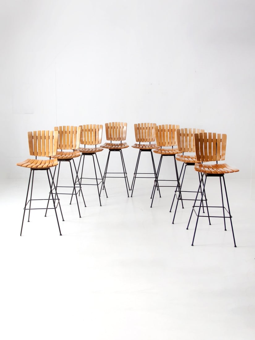 Set of 8 Mid Century Arthur Umanoff Vintage Bar Stools: Set of 8 Mid Century Arthur Umanoff Vintage Bar Stools This exquisite set of eight vintage bar stools, designed by Arthur Umanoff in the 1950s for Raymor Furniture, embodies the timeless elegance of M