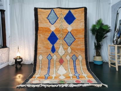 Authentic Moroccan Berber Handmade Rug 6.56 x 3.28 ft Wool: Authentic Moroccan Berber Handmade Rug 6.56 x 3.28 ft Wool This stunning authentic handmade Moroccan Berber rug showcases a vibrant and artistic design, crafted from 100% local sheep wool. Each piece