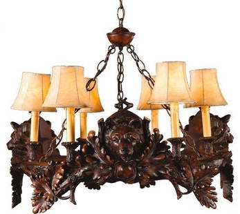 Rustic Lodge Bear Chandelier by OK Casting 20H 29W 29D: Rustic Lodge Bear Chandelier by OK Casting 20H 29W 29D Illuminate your space with this unique hand-cast bear chandelier, crafted to order. This rustic lodge-style chandelier features three bear heads,