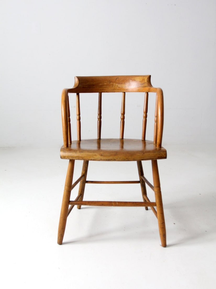 Heritage Collection Antique Captains Chair Wooden Barrel Style: Heritage Collection Antique Captains Chair Wooden Barrel Style Discover the charm of this antique captains chair from our Heritage Collection. Crafted in a classic wooden barrel style, it features a s