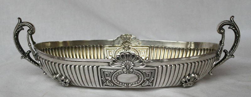 Antique 1900 German 800 Silver Candy Dish Centerpiece: Antique 1900 German 800 Silver Candy Dish Centerpiece This exquisite early 1900's German 800 continental silver candy dish serves as a stunning centerpiece. Crafted from a silver alloy, it features in