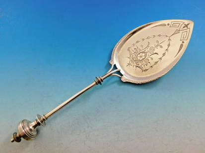 Art Silver 1860-1883 Sterling Silver Pie Server 9 1/4" Monogrammed: Art Silver 1860-1883 Sterling Silver Pie Server 9 1/4" Monogrammed This exquisite sterling silver pie server, crafted in the Art Silver style circa 1860-1883, measures 9 1/4". The piece showcases a un