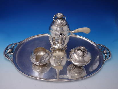 Georg Jensen Blossom Sterling Silver 4-Piece Coffee Set 1900-1940: Georg Jensen Blossom Sterling Silver 4-Piece Coffee Set 1900-1940 Experience timeless elegance with this exquisite Blossom by Georg Jensen Sterling Silver Coffee Set. This stunning 4-piece set, crafte