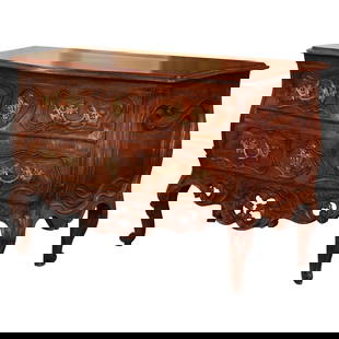 18th Century Louis XV Carved Walnut Bombe Commode Nimes: 18th Century Louis XV Carved Walnut Bombe Commode Nimes This exquisite 18th Century French Louis XV Carved Walnut Bombe Two-Drawer Commode originates from Nimes, Southern France, and showcases the ele
