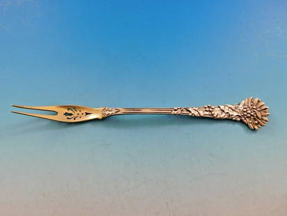 Holly by Tiffany & Co. Sterling Silver Olive Fork 7" 10 Piercings: Holly by Tiffany & Co. Sterling Silver Olive Fork 7" 10 Piercings Discover the exquisite Holly olive serving fork by Tiffany & Co., crafted from high-quality sterling silver. This elegant piece featur