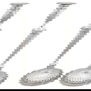 Sterling Silver Candlesticks, Set of 2, 1927: Sterling Silver Candlesticks, Set of 2, 1927 This exquisite pair of sterling silver candlesticks, crafted by Gorham Silversmiths in 1927, showcases a classic tapered design complemented by a large ova