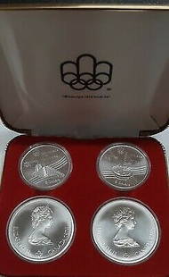 1976 Montreal Olympic Games .925 Silver Four Coin Set RCM OGP: 1976 Montreal Olympic Games .925 Silver Four Coin Set RCM OGP Celebrate the legacy of the 1976 Canada Montreal Olympic Games with this exquisite .925 Silver Four Coin Set, presented in the Royal Canad